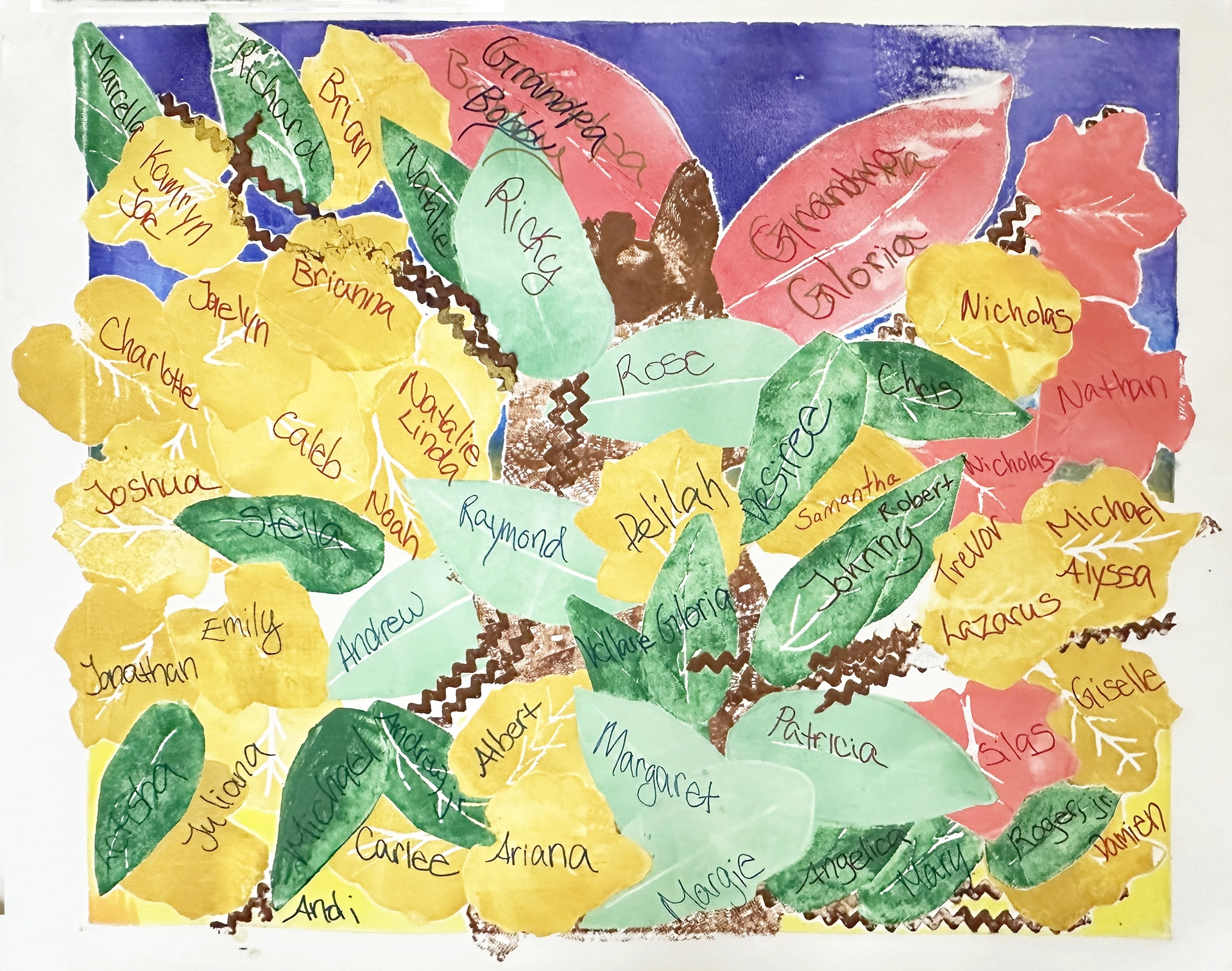 The cobalt blue background peaks through at the top as leaves in yellow, green, and red and brown branches overwhelm the image.