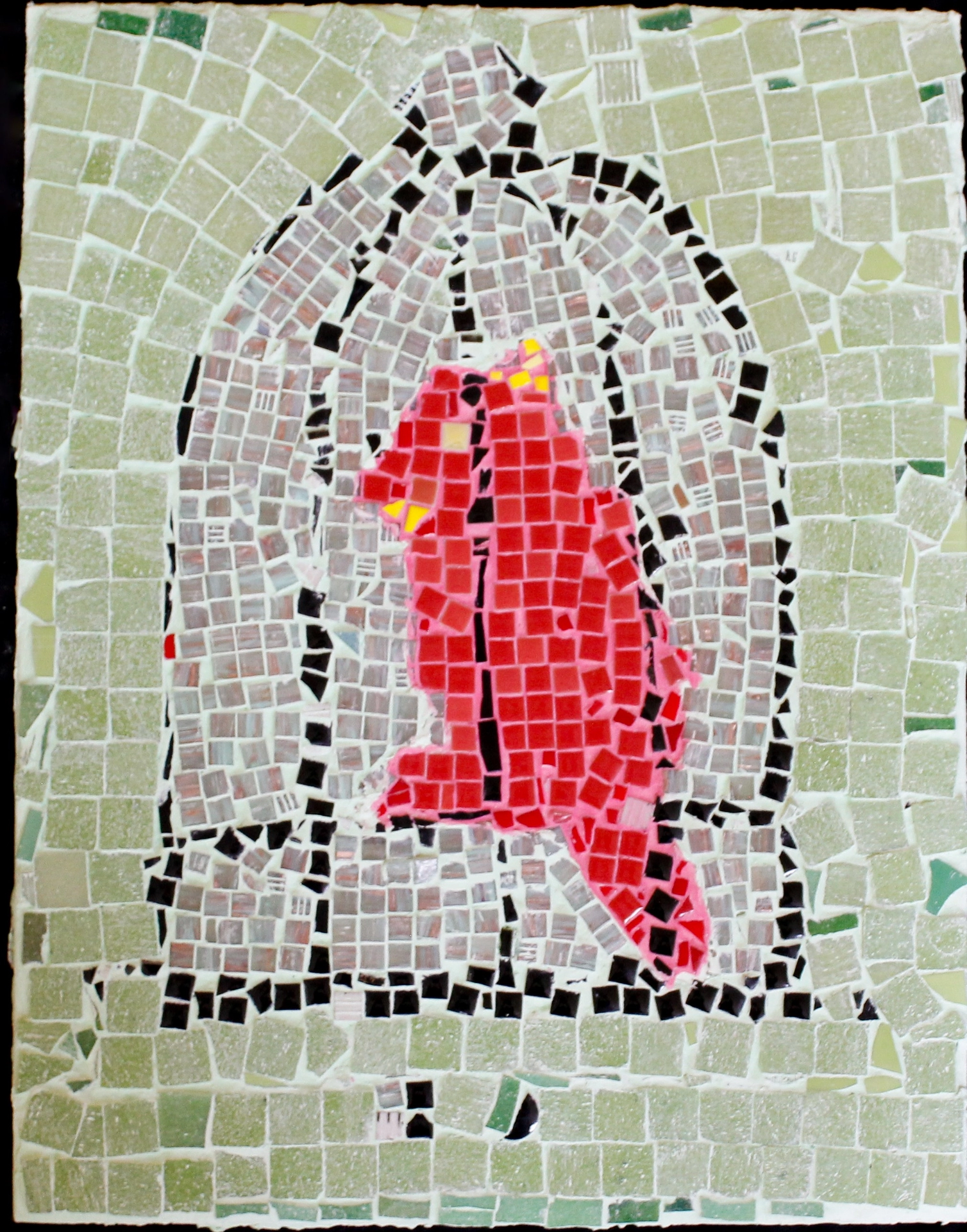 A glass and ceramic mosaic tile of a central bright red bird in a black wire cage on a green background.